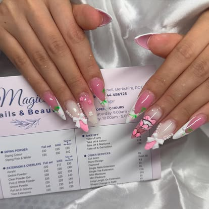 Pink ombre stiletto nails with floral 3D art